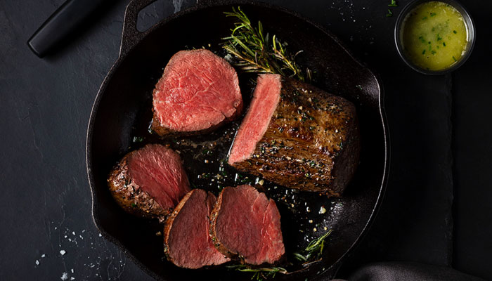 Slow Roasted Tenderloin with Garlic Herb Butter