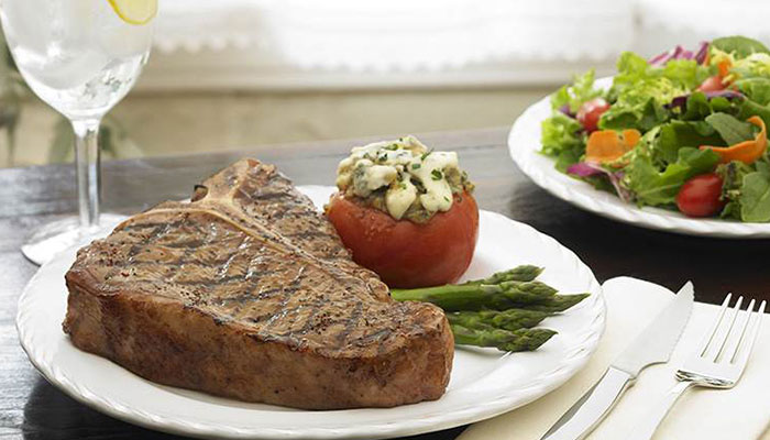 Crushed Garlic T-bone Steaks with Roquefort Tomatoes