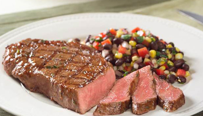 Sizzling NY Strip Steaks